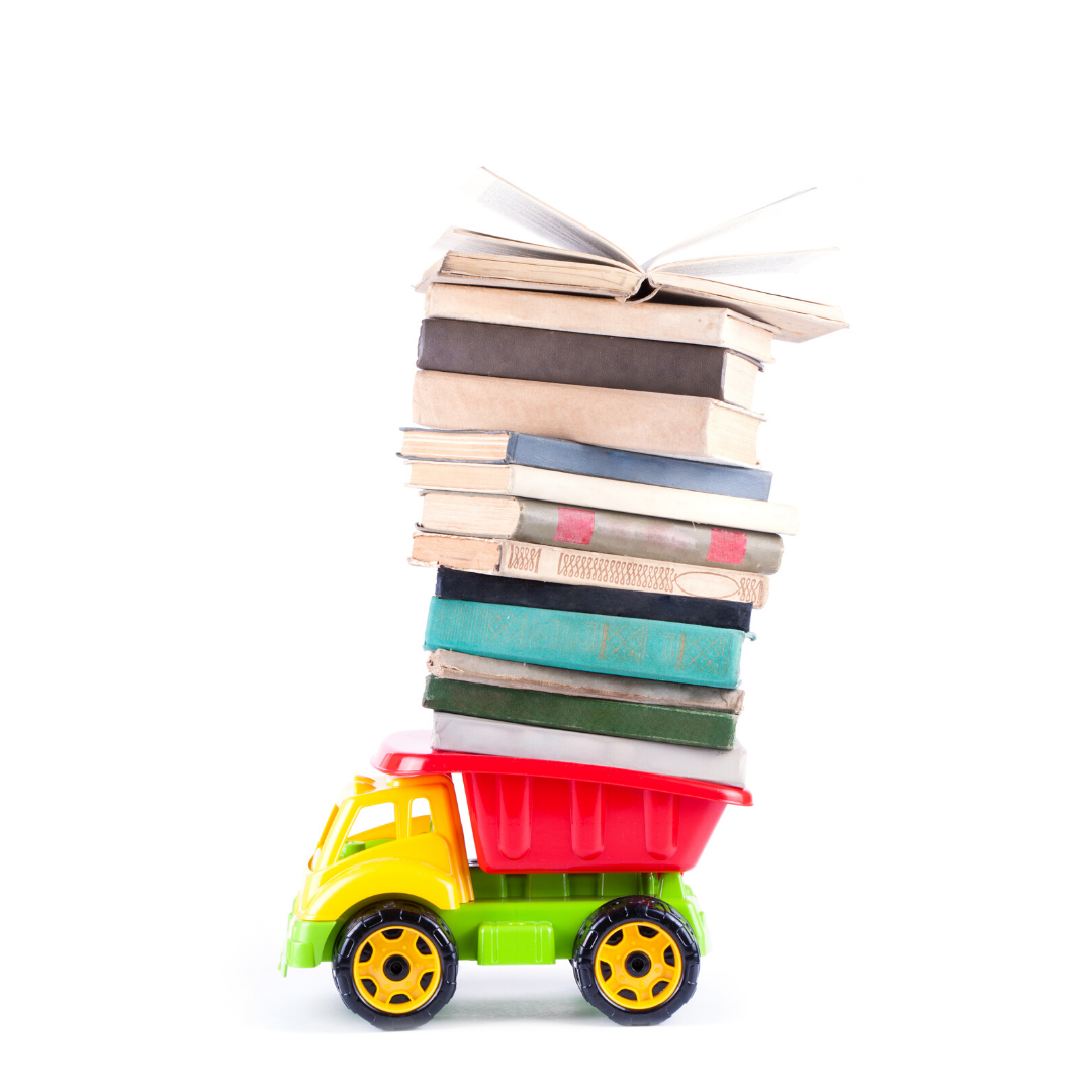 Toy dumper truck carrying pile of books