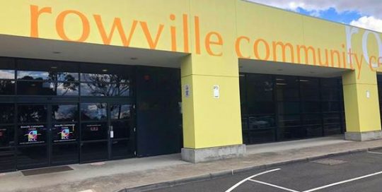 Image shows exterior of Rowville Community Centre building and entrance