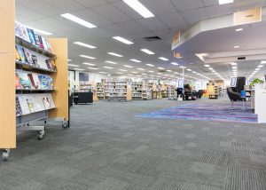 Interior image of library showing display shelves with books
