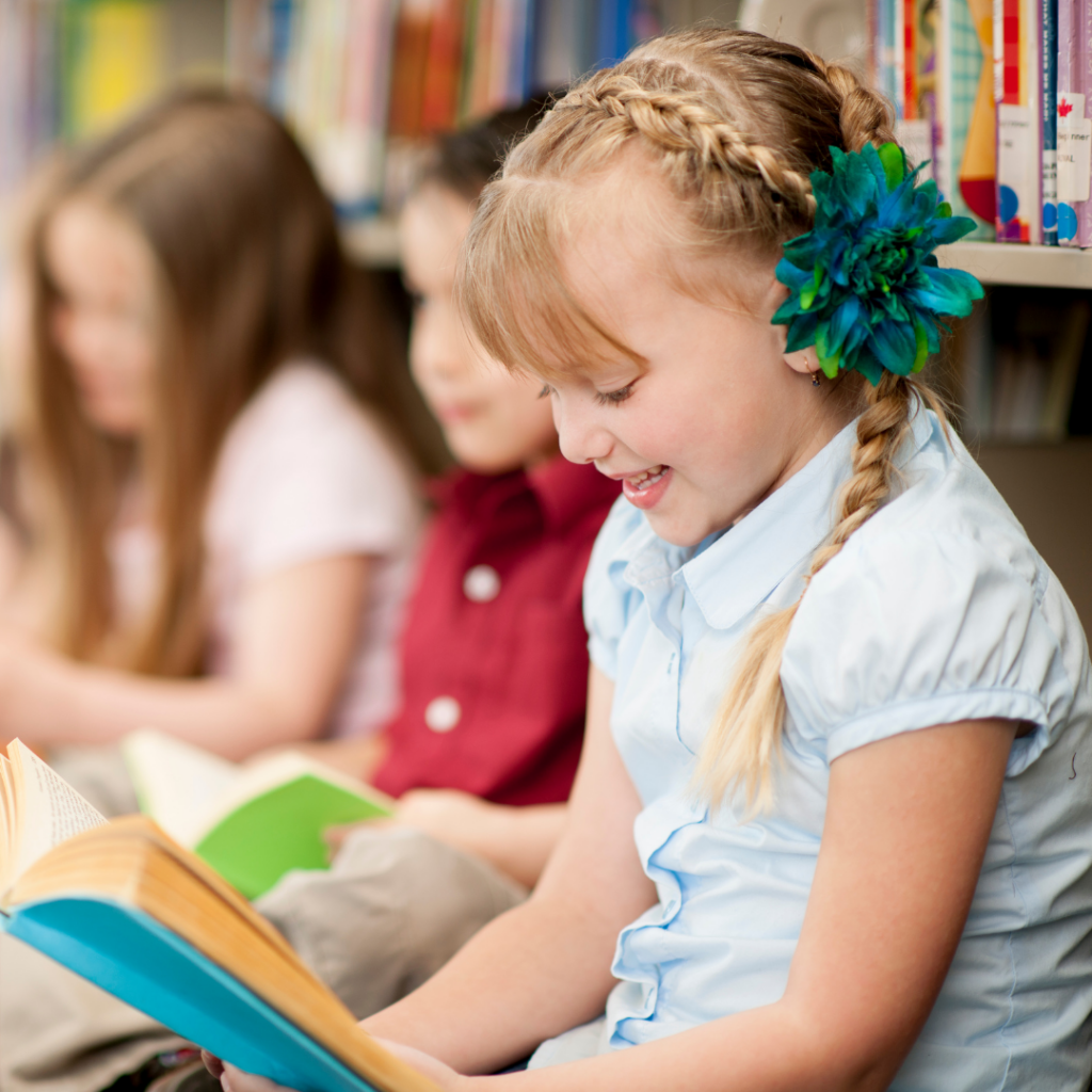 Lib SS Image 2 Children sitting on floor of public library reading