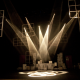 Black box theatre with stage and lighting