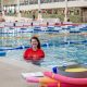 Casey ARC 50m pool with swim instructor in pool wearing red rash vest