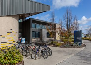 Exterior of Greater Beveridge Community Centre with bike racks and bikes