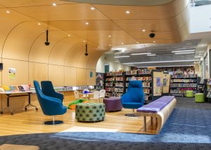 Camberwell Library sitting area with book shelves and books in the background