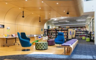 Camberwell Library sitting area with book shelves and books in the background