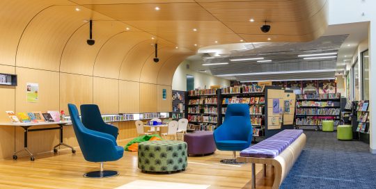 Camberwell Library sitting area with book shelves and books in the background