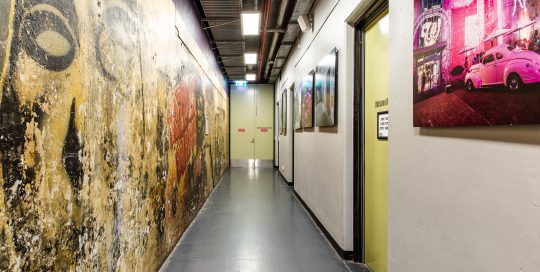 Brisbane Powerhouse back of house corridor with dressing room on the right