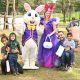Easter Bunny mascot with themed person and young families