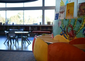 Childrens section at Cambridge Library showing colourful book boxes and furniture