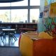 Childrens section at Cambridge Library showing colourful book boxes and furniture