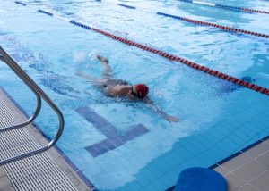 A person swimming in a pool at Bold Park Aquatic