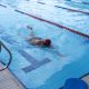 A person swimming in a pool at Bold Park Aquatic