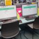 Two desktop computers on a desk at Hastings Library