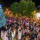 Light Up Windsor Street Fair with event attendees gathered around a large Christmas tree